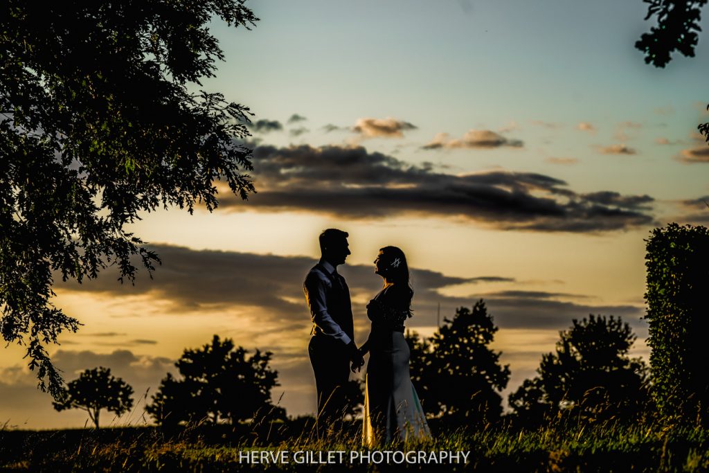beautiful sunset portrait of the bride and groom at Pryors Hayes Golf Club